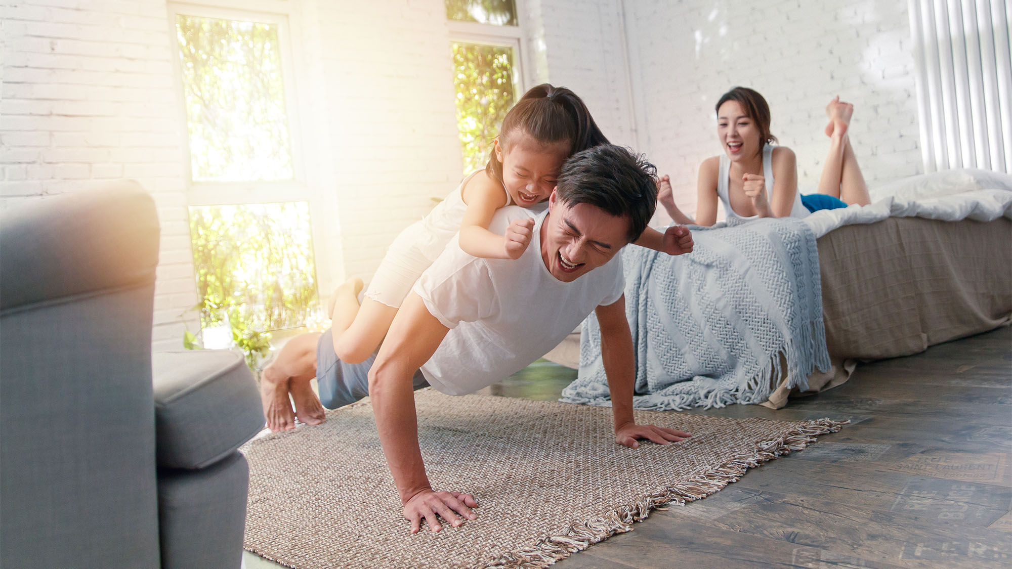 Couple assembling furniture; image used for HSBC Vietnam Personal Safety Insurance page